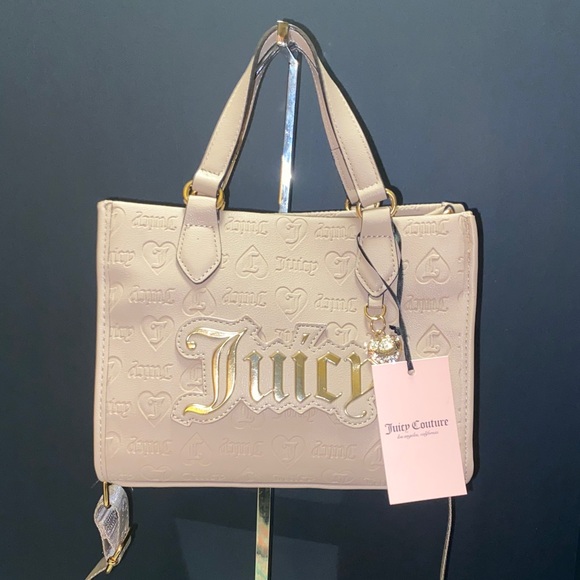 Juicy Couture Handbags - NWT. Juicy Couture Beige Upgrade U Mini Tote
